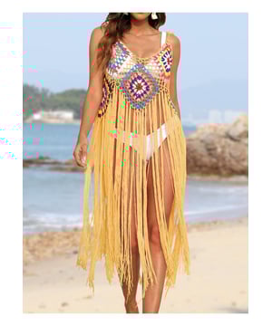 Cubierta de tirantes tipo espagueti con flecos  
Flecos decorativos  
Diseño transparente  
Sin elasticidad  
Material 100% acrílico  
Lavar a máquina en frío, secar a baja temperatura  
Importado  
Talla única: Busto  
74 cm de largo en la parte superior  
105 cm