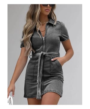 Full size zip front short sleeve denim dress
  Slightly stretchy material for added comfort
  Material composition: 90% viscose 10% polyester
  Features tied detail and pockets
  Care instructions: Machine wash cold tumble dry low
  Imported