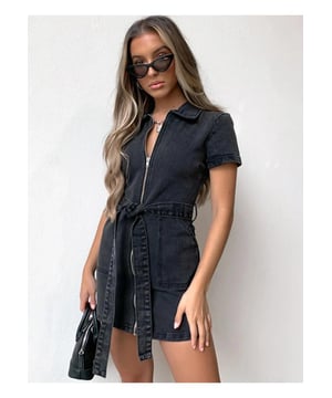 Full size zip front short sleeve denim dress
  Slightly stretchy material for added comfort
  Material composition: 90% viscose 10% polyester
  Features tied detail and pockets
  Care instructions: Machine wash cold tumble dry low
  Imported