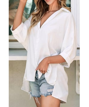 Camisa de cuello con mangas tres cuartos  
Estilo básico  
Sin elasticidad  
Composición del material: 100% poliéster  
Instrucciones de cuidado: Lavado a máquina en frío, secar a baja temperatura  
Importada