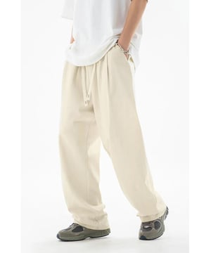 Pantalones de chándal de estilo básico  
Hechos de 100% algodón  
Lavar a máquina en frío y secar a baja temperatura  
Importado  
Cintura con cordón ajustable para un ajuste personalizable  
Múltiples bolsillos para mayor comodidad  
Disponible en tallas M a 4XL  
Mediciones del producto proporcionadas en pulgadas  
Material: El material parece ser una mezcla ligera de lino o algodón. La tela se ve suave y tiene una calidad ligeramente caída.