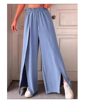 Broek met wijde pijpen
  Kenmerken: Split Franje
  Materiaalsamenstelling: 95% polyester 5% spandex
  Onderhoudsinstructies: Machinewas koud. Droogtrommel laag.
  Geimporteerd