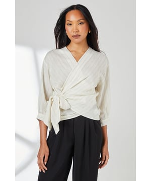 Elegant wrap design with side tie fastening for a flattering silhouette
        Subtle striped pattern adds visual interest to this versatile piece
        Three-quarter length sleeves offer practical coverage for transitional weather
        Lightweight linen blend fabric provides breathable comfort for all-day wear
        Versatile regular fit allows for easy layering and styling options
    
    This Principles wrap top combines effortless style with everyday practicality. The distinctive wrap design creates a feminine silhouette that flatters all figures, whilst the subtle striped pattern adds a touch of sophistication. Style with wide-leg trousers as shown for a contemporary daytime look that works beautifully for lunch dates or casual office settings. For weekend outings, pair with your favourite denim and trainers for an understated yet polished ensemble. The neutral tone makes this top incredibly versatile - layer under a tailored blazer when the temperature drops or wear alone with statement jewellery for casual gatherings. The linen blend fabric offers a textural element that transitions seamlessly between seasons, making this a wardrobe staple you'll reach for time and again.