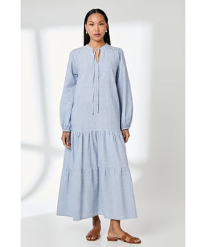 Elegant tie-front detail at the crew neckline for adjustable styling
        Charming blouson sleeves with elasticated cuffs for a feminine silhouette
        Tiered maxi design with relaxed fit creating a breezy, effortless shape
        Delicate stripe pattern throughout with intricate smocking detail at shoulders
        Crafted from breathable cotton fabric, perfect for warm-weather comfort
    
    This Principles maxi dress combines casual comfort with refined style. The relaxed silhouette features a tiered skirt that creates beautiful movement as you walk, while the blouson sleeves add a touch of romance to your everyday wardrobe. Pair with leather sandals as seen on our model for laid-back weekend brunches, or dress up with espadrille wedges for garden parties. The tie-front neckline allows for customisable styling, making this versatile piece ideal for family gatherings or casual outings. The lightweight cotton construction ensures all-day comfort, whether you're strolling through farmers' markets or enjoying afternoon tea with friends. Complete your look with simple hoop earrings and a woven tote for the perfect daytime ensemble.