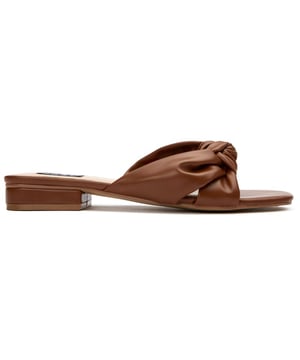 Welcome the summer in these fashion-forward, super comfy V.Gan's Vegan Salsify Knot slide. Crafted from high-quality PETA-approved vegan uppers and soles, these sandals have a square-toed silhouette, offering sleek style and ethical chic. Made in a certified vegan factory using sustainably sourced materials and shipped in recycled packaging, this warm-weather staple will take you from boardwalk and seaside promenade to summer parties and urban alfresco outings.