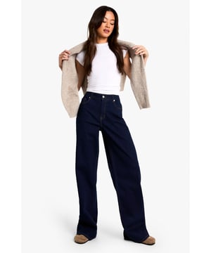 Relaxed boyfriend fit designed specifically for taller frames
        Wide-leg silhouette offering maximum comfort and movement
        Classic five-pocket design with functional front and back pockets
        High-rise waistband for a flattering and secure fit
        Durable denim fabric with slight stretch for all-day comfort
    
    These Tall Boyfriend-Jeans from Boohoo deliver the perfect balance of comfort and style for the fashion-forward woman. The relaxed, wide-leg silhouette creates a laid-back vibe while the high-rise waist offers a figure-enhancing fit that works brilliantly with cropped tops or tucked-in tees. Style them as seen with a simple white t-shirt and neutral cardigan for effortless daytime chic, or dress them up with a bodysuit and statement jewellery for casual evenings out. The versatile design makes these jeans ideal for weekend brunches, shopping trips with mates, or casual Fridays at work. Pair with trainers for a cool, casual look or add chunky boots to give your outfit an edgier feel. These boyfriend jeans are a wardrobe essential that will quickly become your go-to for comfortable yet stylish everyday wear.
