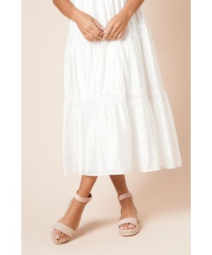 Woven textile upper with delicate ankle strap design for secure fit
        Comfortable medium wedge heel measuring between 5-6.5cm for all-day wearability
        Classic espadrille rope detailing around the sole for a summery aesthetic
        Adjustable buckle fastening for personalised comfort
        Versatile open-toe silhouette perfect for warmer weather styling
    
    These Riva Woven Textile Espadrille Wedges from Dorothy Perkins offer the perfect balance of comfort and style for your casual wardrobe. The medium wedge provides just enough height to flatter your silhouette without sacrificing comfort, making these sandals ideal for extended wear. Style them with a flowing midi dress as shown for brunches with friends or family gatherings. The neutral tone works beautifully with both printed and plain garments, while the woven texture adds subtle interest to any ensemble. These versatile sandals transition effortlessly from daytime casual to relaxed evening occasions-pair with cropped trousers and a light blouse for garden parties, or team with a casual maxi dress for seaside strolls. The timeless espadrille design ensures these will remain a wardrobe favourite season after season.