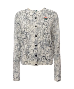 100%Cotton The Paul Smith Women?s Cardigan in ecru is made from 100% cotton, offering a soft and breathable feel. This cardigan is perfect for layering and can be styled for both casual and formal occasions. It features a classic design with a button-through front, making it a versatile addition to your wardrobe