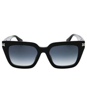 Discover the perfect blend of style and sophistication with the Marc Jacobs MJ 1083/S 0807 9O Black/Grey Gradient Sunglasses. These sunglasses feature a sleek black frame paired with elegant grey gradient lenses, offering both eye protection and a modern aesthetic. Designed for comfort and durability, they are ideal for daily wear or special occasions. Elevate your look effortlessly while shielding your eyes from harmful UV rays with this iconic accessory that embodies luxury and contemporary fashion. Make a statement wherever you go with these timeless Marc Jacobs sunglasses. Size 52X19X140, Material 100% Acetate. Made In Italy. Sunglasses come with branded case and cleaning cloth