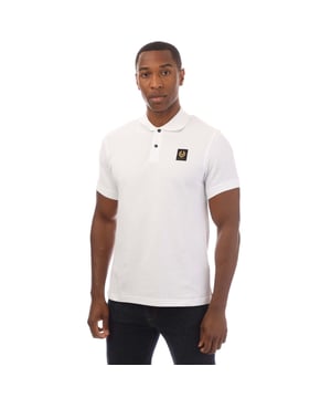 Mens Belstaff Cotton Piqué Polo Shirt in white.- Ribbed polo collar.- Two button placket.- Short sleeves with ribbed cuffs.- Embroidered Phoenix logo patch at left chest.- Uneven vented hem.- Textured cotton piqué made from organically grown cotton.- Regular fit.- Body: 100% Cotton.  Rib: 100% Cotton.  Machine washable.- Ref: 101516WHITE