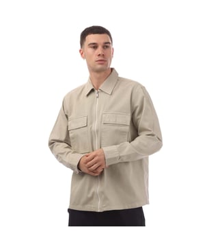 Mens Hugo Boss Lovel Zipped Overshirt in beige.- Classic collar.- Long sleeves.- Soft twill with embroidered branding on the pocket.- Branded button fastening cuffs.- Woven orange locker loop on the interior neckline.- Oversized fit.- 100% Cotton.- Ref: 50520107271