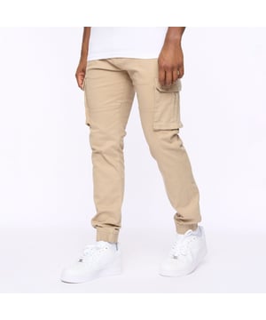 Presenting our men's straight cargo pants  featuring a top button fastening and scooped front pocket mouths for added convenience. These pants also include button-fastened cargo pockets and hidden button-fastened back pocket flaps for secure storage. Complete with a back waist leather patch.