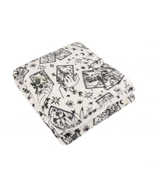 Wrap yourself in the enchanting warmth of the Celestial Stories Printed Fleece Throw, where comfort meets artistry. This luxuriously soft fleece showcases a beautifully intricate design inspired by celestial and tarot elements, featuring hand-painted cards, delicate motifs, and entwined vines that evoke a sense of mystery and wonder. Perfect for a chilly evening or adding a striking statement to your living space, its sumptuously soft fleece and sherpa reverse offer both style and indulgent cosiness. Whether draped over a sofa or used for an evening of relaxation, this throw is ideal for those who cherish both individuality and comfort within their home. 130 x 180cm