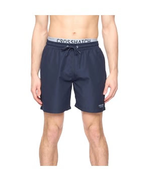 100% Polyester. Design: Logo. Pockets: 2 Side Pockets, 1 Back Pocket. Fastening: Pull-On. Metal Eyelets. Waistline: Adjustable, Branded, Drawstring.