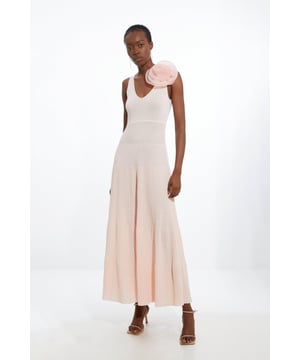 Elevate your formal wardrobe in our occasion dress, with a bodycon fitting bodice which flows into a flared skirt, a plunging V neckline which accentuates the bust, and a statement three dimensional corsage design. Style it with strappy heels for an occasion look that is guaranteed to turn heads wherever you step. Viscose Blend Knit Corsage Detail Maxi Dress High Quality, Soft Knit Fabric Statement Three Dimensional Rosette Detailing Figure Hugging Bodice Flared, Flowing Skirt Plunging V Neckline