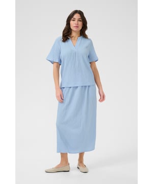 Regular fit,Korte mouwen  Wassen op 30°, niet bleken, niet in de droger drogen, Druipnat ophangen in de schaduw, warm strijken max. 150° C, Droogreiniging  100% Polyester