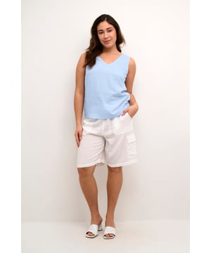 Regular fit,Mouwloos  Fijne was 30°, niet bleken, niet in de droger drogen, Druipnat ophangen in de schaduw, warm strijken max. 150° C, Droogreiniging  70% Viscose (LivaEco™),30% Linnen