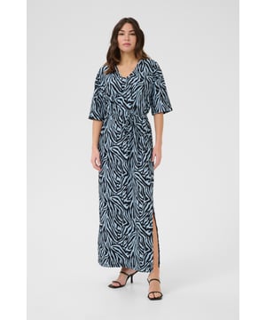 Loose fit,Enkel lengte,Elleboog lengte  Fijne was 30°, niet bleken, niet in de droger drogen, Druipnat ophangen in de schaduw, koud strijken max. 110° C, Niet droog reinigen  95% Polyester (Gerecycled),5% Elastaan
