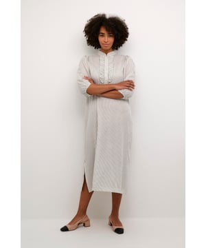 Regular fit,Midi lengte,Elleboog lengte  Fijne was 30°, niet bleken, niet in de droger drogen, Druipnat ophangen in de schaduw, warm strijken max. 150° C,.  100% Viscose (LENZING™ ECOVERO™)