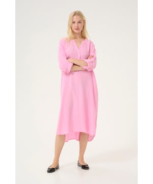 Oversize fit,Midi lengte,3/4 mouwen  Fijne was 30°, niet bleken, niet in de droger drogen, koud strijken max. 110° C, Niet droog reinigen  100% Katoen