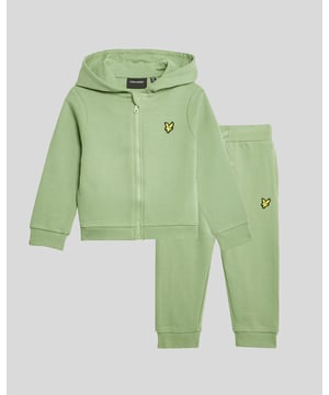 Introducing our exquisite T-Shirt & Short Set, a hallmark of our kidswear collection that effortlessly combines comfort and style. Crafted from 100% premium cotton, this ensemble offers a regular fit designed for active toddlers. The elegant design showcases our meticulous attention to detail, making it a perfect addition to your child’s wardrobe.\n\n- Composition: 100% Cotton \n- Fit: Regular \n- Logo Branding: Distinctive logo detailing \n- Branding Location: Strategically placed for subtle elegance \n- Versatile styling for various occasions \n\nElevate your child's attire with this sophisticated set, perfect for warm spring days and playful adventures.