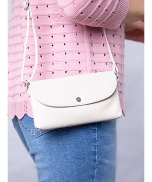 Streamlined, stylish, and just the right size, the Tawns bag is your go-to for those essentials you can&rsquo;t leave home without.
Compact yet practical, this mini cross-body bag is perfectly sized for your phone, keys, and other small must-haves. Crafted from real leather for a touch of understated luxury, it features a secure flapover press-stud fastening and an adjustable strap for the perfect fit.
With a soft fabric lining to protect your items, the Tawns is as functional as it is effortlessly chic.
