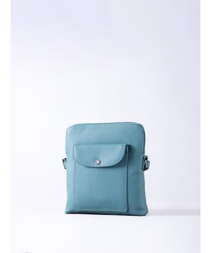 The Tirrill cross body bag combines timeless design with practical functionality. Made from real leather, it&rsquo;s a versatile addition to your wardrobe, ideal for both day-to-day wear and special outings.
The adjustable cross-body strap allows for a customizable fit, while the flapover press-stud front pocket keeps your essentials close at hand. Inside, you'll find zip and slip pockets, perfect for organizing your belongings, all finished with a fabric lining for added refinement.
The Tirrill bag is compact yet spacious enough for all your daily must-haves, making it the perfect portable companion.