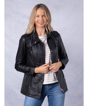 The Levens field jacket, crafted in sumptuously soft UK-sourced black leather, is designed to protect you from the elements and keep you looking stylish.This jacket features a funnel neck drawstring collar and front pockets, as well as a drawstring waist so it can be worn cinched in or left loose. Its longer length and centre zip fastening with added front placket provides added protection from the great British weather, and equally serves to flatter your form.
