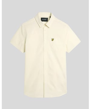 Introducing the Plain Poplin Short Sleeve Shirt from our Legacy collection, designed for the discerning man who appreciates sophistication and comfort. This shirt combines timeless elegance with a relaxed fit, making it an essential addition to the modern wardrobe. Its refined poplin fabric offers a breathable experience, suitable for both casual and formal occasions.

- Composition: 100% Cotton for unparalleled comfort
- Fit: Regular, tailored for ease of movement
- Logo Branding: Discreetly positioned for understated style
- Versatility: Ideal for layering or wearing solo

Elevate your spring menswear collection with this classic piece, blending style and functionality effortlessly.