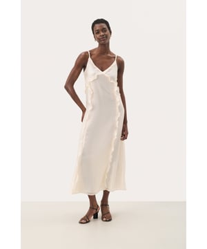 Oversize fit,Über Knöchellänge,Ärmellos  Schonwäsche 30°, Nicht bleichen, Nicht im Trockner trocknen, Tropnass aufhängen im Schatten, Kalt bügeln max. 110° C, Trockenreinigung  83% Lyocell ( TENCEL™),17% Nylon