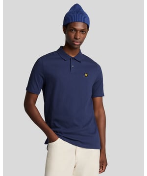 Introducing the Crepe Polo Shirt, a pinnacle of sophistication in our Spring menswear collection. This elegant piece features a refined relaxed fit and is crafted from a luxurious blend of 98% cotton and 2% elastane, ensuring ultimate comfort and mobility. Thoughtfully designed with a two-button placket and adorned with the distinctive Golden Eagle tab on the left chest, this polo exemplifies timeless style and versatility.

- Composition: 98% Cotton, 2% Elastane
- Fit: Relaxed
- Logo Branding: Golden Eagle tab
- Logo Placement: Left chest
- Versatile styling for casual and semi-formal occasions

Elevate your wardrobe with this sophisticated polo, perfect for the discerning gentleman this spring.
