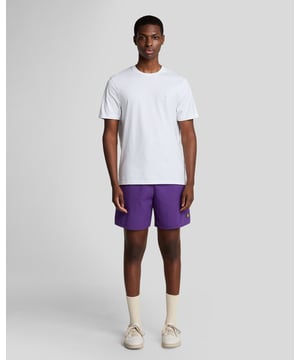 Finished with our signature Golden Eagle, these mesh-lined plain swim shorts, with fast-drying fabric, deliver the iconic Lyle & Scott style both in and out of the pool.