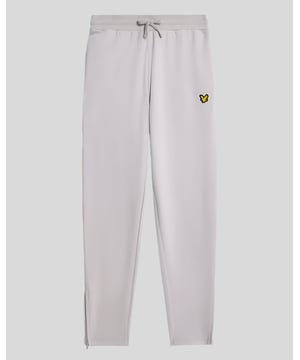 Unsere Fly Fleece Trackies bestehen aus leichter und weicher Viskose und bieten so zusätzliche Dehnbarkeit und Vielseitigkeit, egal ob Sie aktiv sind oder nicht.– 70 % Viskose, 22 % Polyamid, 8 % Elastan– Kordelzug in der Taille– 2 Seitentaschen– 360 g/m² Stoff– Bündchen mit Reißverschluss an den Seitennähten