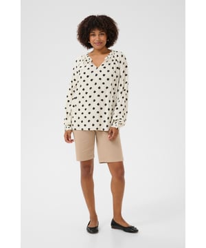 Regular fit,Heup lengte,Lange mouwen  Fijne was 30°, niet bleken, niet in de droger drogen, Druipnat ophangen in de schaduw, koud strijken max. 110° C,   100% Viscose (LENZING™ ECOVERO™)