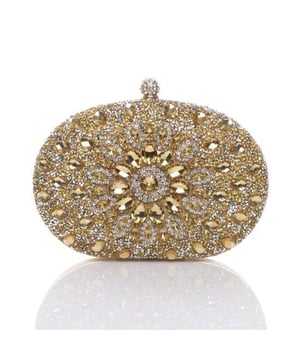 Glamorous oval clutch bag featuring dazzling diamante embellishments. A perfect statement piece for evening events and special occasions.Short Handle and long Chain Strap Included. Clean With Soft Brush Gently.Outer - Polyester and glass beads Lining - Polyester.H 14cm D4cm W 20cm. SKU: HB345724.
