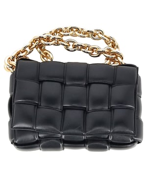 VINTAGE, RRP AS NEW
The Bottega Veneta Chain Cassette Bag in black leather is a masterclass in bold sophistication. Showcasing the house’s signature maxi Intrecciato weave, this standout piece is crafted from plush padded leather and features a chunky gold-finish chain strap that doubles as jewelry. The interior is lined with bonded lambskin and includes a single zipped pocket for essentials, while a metal closure ensures a seamless finish. Equal parts iconic and innovative.


Bottega Veneta Chain Cassette Bag in Black Leather
Condition: Excellent
Signs of wear: No retail tag, No visible sign of wear., 
Packaging: Dust bag
Color: black
Material: Leather | leather
Size: One Size | One Size
Measurements: Width: 80; Height: 180; Length: 250
SKU: NAPPUGBBA494828W