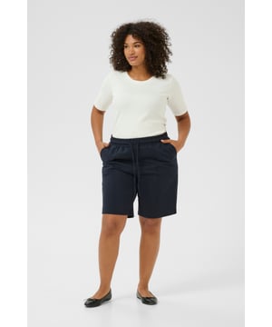 Regular fit,Elastische Taille,Über Knielänge  Schonwäsche 30°, Nicht bleichen, Nicht im Trockner trocknen, Tropnass aufhängen im Schatten, Warm bügeln max. 150° C, Trockenreinigung  85% Baumwolle,15% Polyester