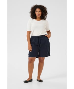 Loose fit,Elastische taille,Taille lengte,Straight  Wassen op 30°, niet bleken, drogen in droger behoedzaam, Druipnat ophangen in de schaduw, warm strijken max. 150° C,   100% Katoen