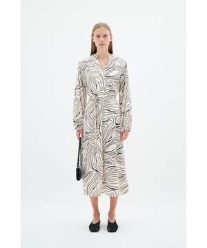 Fijne was 30°, niet bleken, niet in de droger drogen, koud strijken max. 110° C, Droogreiniging  100% Polyester
