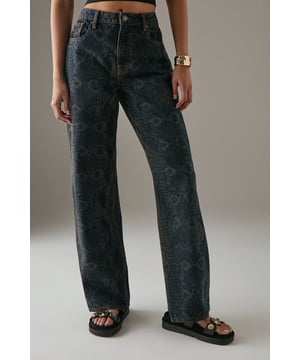 Striking snake print pattern throughout for a bold fashion statement
        Relaxed straight leg silhouette offering comfortable movement
        Classic five-pocket design with traditional denim detailing
        High-rise waist for a flattering and contemporary fit
        Durable cotton denim fabric that maintains its shape throughout wear
    
    Make a confident statement with these Warehouse Snake Print Straight Leg Jeans. The relaxed fit combined with the eye-catching pattern creates a perfect balance between comfort and style. Pair with a fitted black crop top and chunky sandals for an effortlessly cool daytime look, as styled on our model. For casual gatherings, team with an oversized white shirt, leaving it partially unbuttoned and front-tucked for a relaxed vibe. These versatile jeans transition beautifully from day to night - simply swap your trainers for ankle boots and add a leather jacket for evening drinks with friends. The straight leg silhouette works brilliantly with both flat and heeled footwear, making these jeans a truly adaptable wardrobe staple for the fashion-forward woman who appreciates distinctive design with everyday wearability.