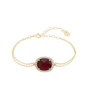 The Beatrice Oval gemstone bracelet is sure to make a stunning splash for any fashionista's wardrobe. Crafted with graceful elegance, this double chain bracelet dazzles the eye with the multifaceted oval garnet, surrounded by illustrious cubic zirconia detailing that adds extra sparkle and shine.Garnet is a beautiful gemstone that has many meanings and properties associated with it. It is often seen as a symbol of protection, friendship, loyalty, faith, courage and strength.This bracelet will easily become your go-to everyday accessory or add the perfect finishing touch to any evening look. With a length of 14.5 cm + 5cm adjuster, it fits most wrist sizes comfortably, while the gold plated 925 sterling silver setting adds excellent durability - it's guaranteed to be a piece that will last and weighing a lightweight 4.3 grams it's comfortable to wear all day long.Step into confidence and style when you add this gorgeous Beatrice Oval Gemstone Bracelet to your jewellery collection today!