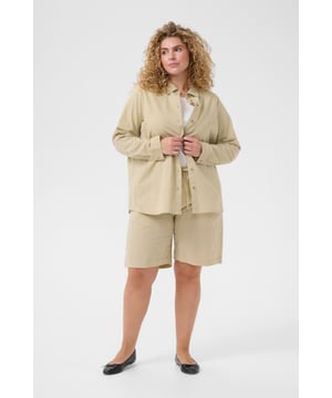 Loose fit,Lange mouwen  Wassen op 30°, niet bleken, drogen in droger behoedzaam, Druipnat ophangen in de schaduw, warm strijken max. 150° C, Droogreiniging  100% Katoen