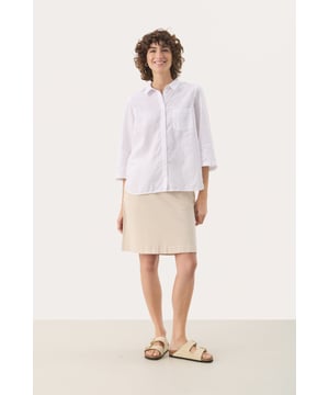 Relaxed fit,3/4 mouwen  Fijne was 30°, niet bleken, niet in de droger drogen, Druipnat ophangen in de schaduw, koud strijken max. 110° C,   55% Linnen,45% Katoen