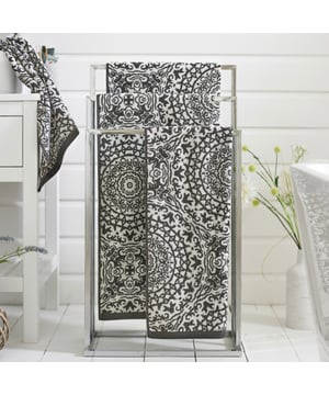 Crafted from superior-quality 550gsm yarn-dyed jacquard, this towel provides an exceptionally soft and absorbent feel, ensuring ultimate comfort and performance. Designed to elevate your bathroom's aesthetic, the Lacy Connection towel is available in two sophisticated colorways: Blue and Caviar. The intricate jacquard design showcases an elegant lace-inspired pattern, blending classic and contemporary styles. The intricate detailing adds a decorative touch, perfect for enhancing the ambiance of any bathroom decor.