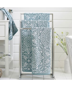 Crafted from superior-quality 550gsm yarn-dyed jacquard, this towel provides an exceptionally soft and absorbent feel, ensuring ultimate comfort and performance. Designed to elevate your bathroom's aesthetic, the Lacy Connection towel is available in two sophisticated colorways: Blue and Caviar. The intricate jacquard design showcases an elegant lace-inspired pattern, blending classic and contemporary styles. The intricate detailing adds a decorative touch, perfect for enhancing the ambiance of any bathroom decor.