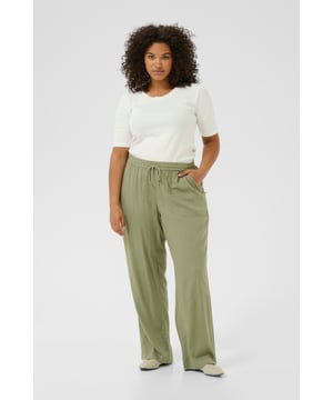 Loose fit,Elastische Taille,Lang,Weite leg  Schonwäsche 30°, Nicht bleichen, Nicht im Trockner trocknen, Tropnass aufhängen im Schatten, Warm bügeln max. 150° C, Trockenreinigung  70% Viskose (LivaEco™),30% Leinen