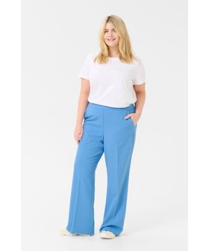 Regular fit,Elastische Taille,Lang,Weite  30° waschbar, Nicht bleichen, Nicht im Trockner trocknen, Tropnass aufhängen im Schatten, Kalt bügeln max. 110° C, Trockenreinigung  77% Polyester (Recycelt),18% Viskose,5% Elasthan