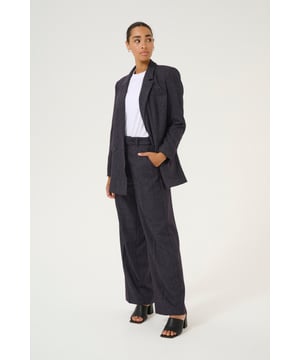Loose fit,Hohe Taille,Lang,Weite leg  Schonwäsche 30°, Nicht bleichen, Nicht im Trockner trocknen, Tropnass aufhängen im Schatten, Kalt bügeln max. 110° C, Trockenreinigung  56% Polyester,40% Viskose,4% Elasthan