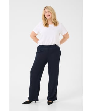Loose fit,Elastische Taille,Lang,Weite leg  Schonwäsche 30°, Nicht bleichen, Nicht im Trockner trocknen, Tropnass aufhängen im Schatten, Warm bügeln max. 150° C, Trockenreinigung  55% Baumwolle,45% Polyester