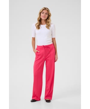 Regular fit,Elastische taille,Lange lengte,Relaxed  Wassen op 30°, niet bleken, niet in de droger drogen, Druipnat ophangen in de schaduw, koud strijken max. 110° C, Droogreiniging  76% Polyester (Gerecycled),20% Viscose,4% Elastaan